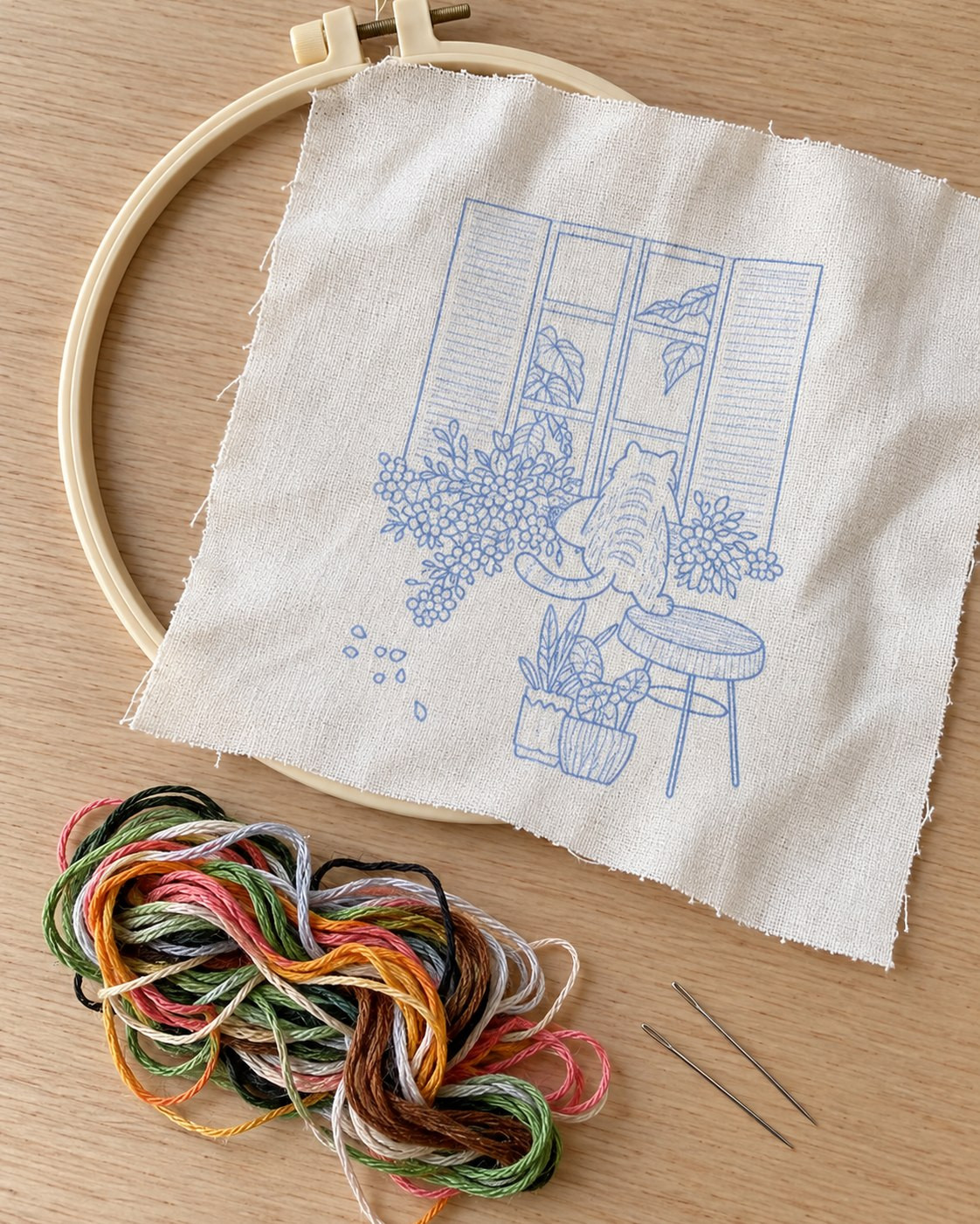 Kit broderie — Chat roux à la fenêtre fleurie