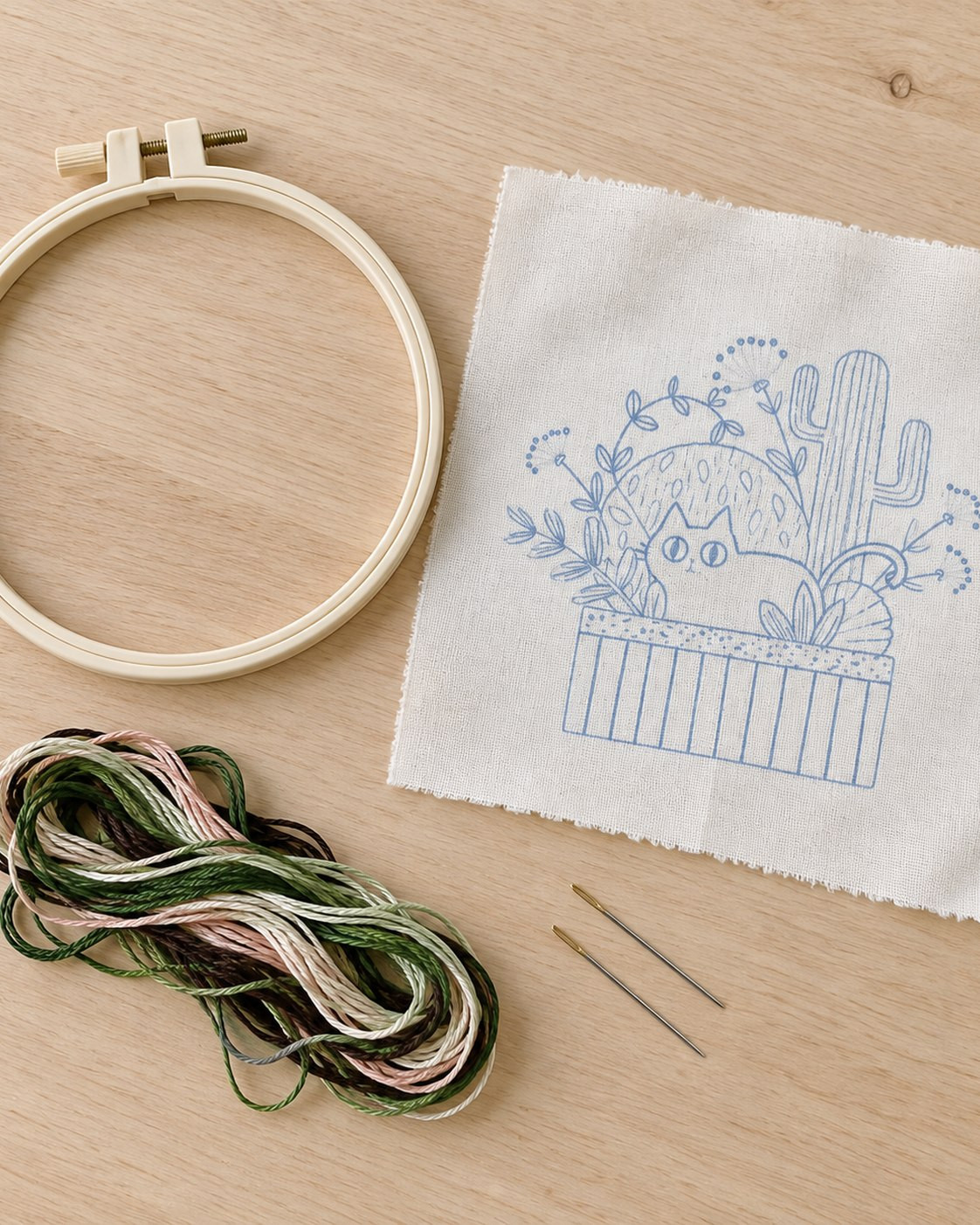 Kit broderie — Chat noir dans les cactus