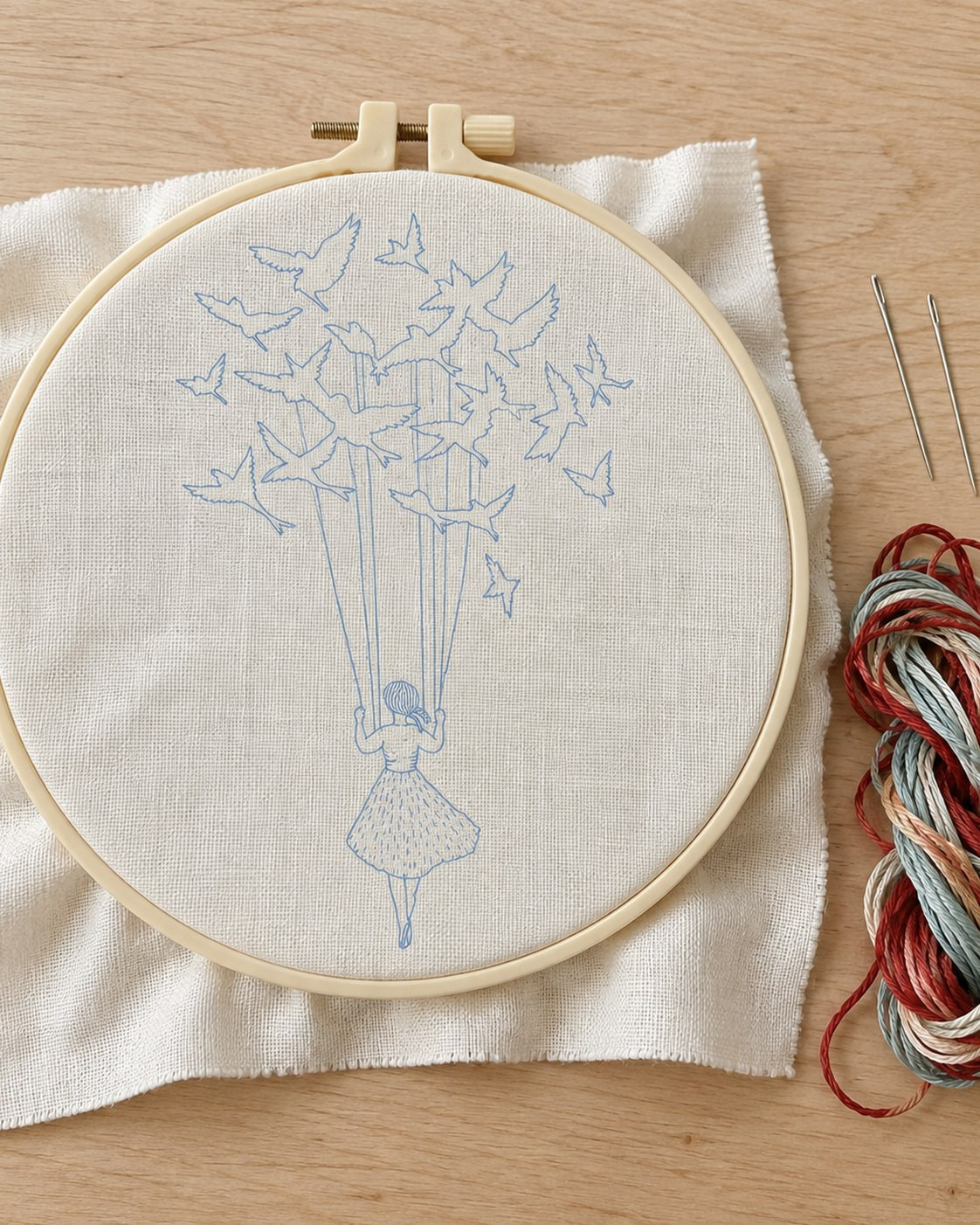 Kit broderie — Jeune fille portée par les oiseaux